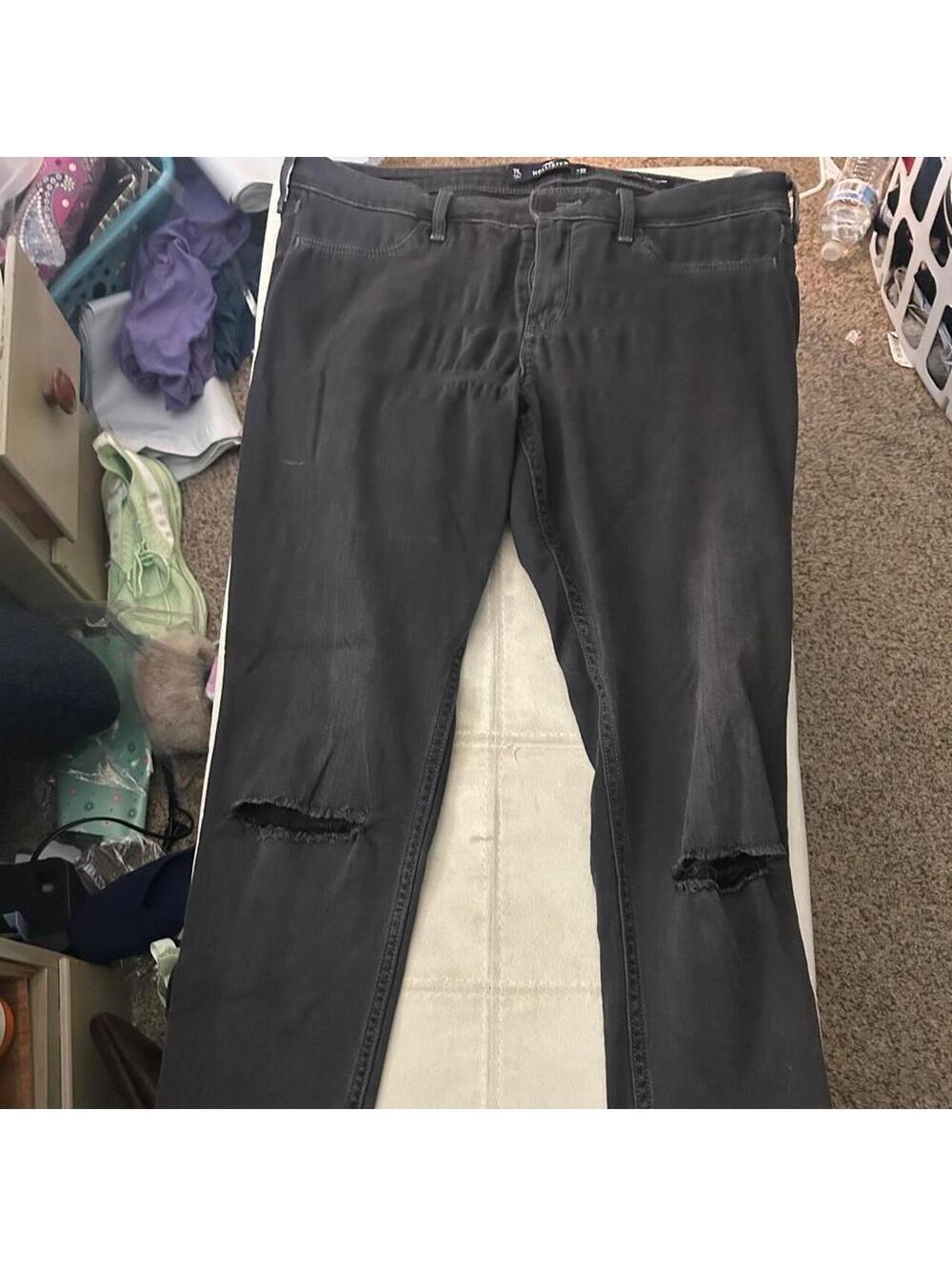 Black Hollister Co. low rise jeans with ripped details, size W30 L30